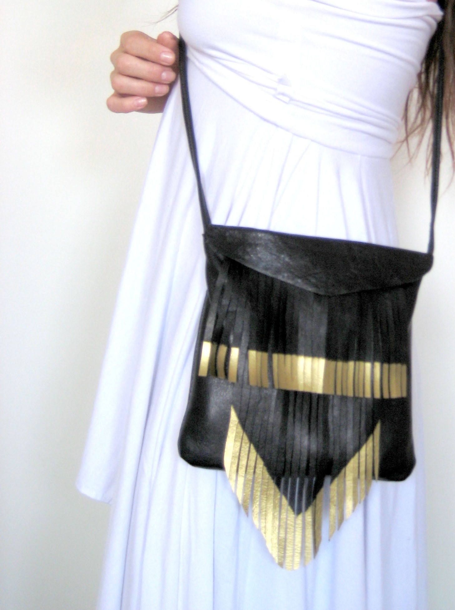 square gold tip fringe bag