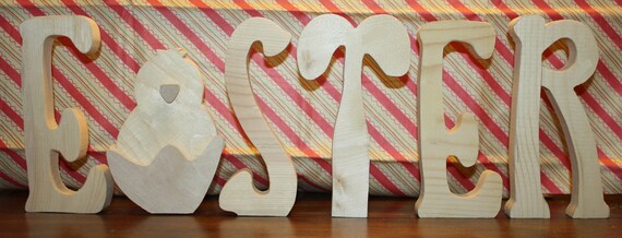 UNFINISHED  Easter wood letters with chick as the "A" and rabbit as the "T".