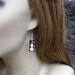 Earrings - snowmen and snowflakes on black glass beads with silver accents - lovely for the holidays and christmas