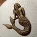 Round Mermaid Flask Hip Flask Silver & Brass Gothic Victorian Nautical Steampunk Pirate Accessories Featured on TheAwesomer dot com