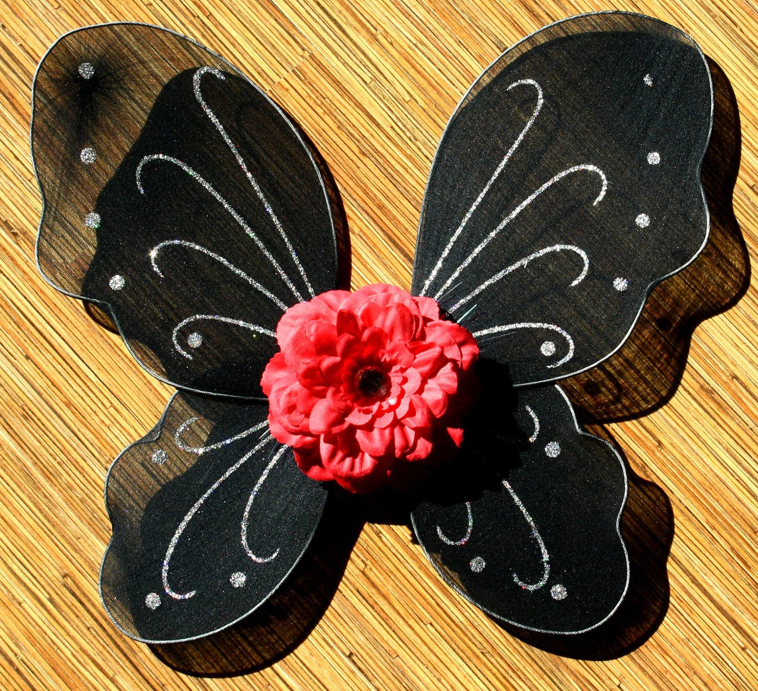 Black Butterfly Wings with Red Dahlia - myuberlicious
