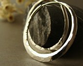 sterling silver hoop earrings 1 1/4 inch flat hammered endless style hoop