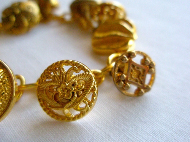 Charm bracelet, button bracelet, gold