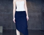 Black ecocotton jersey midi skirt with asymmetrical hem and decorative seams