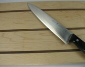 maple cutting board with black walnut stripes