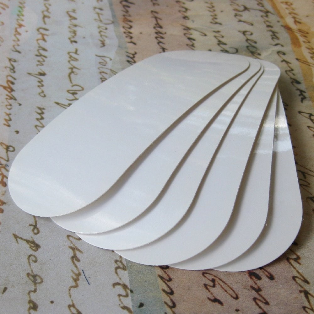 White glossy long ovals