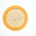 tangerine creamsicle modern wall clock