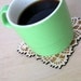 square doily coasters with natural woodgrain