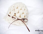 Baby Hat. Crocheted Bonnet Vintage Style for Newborn to 3 Months. Ivory with a Brown Bow.