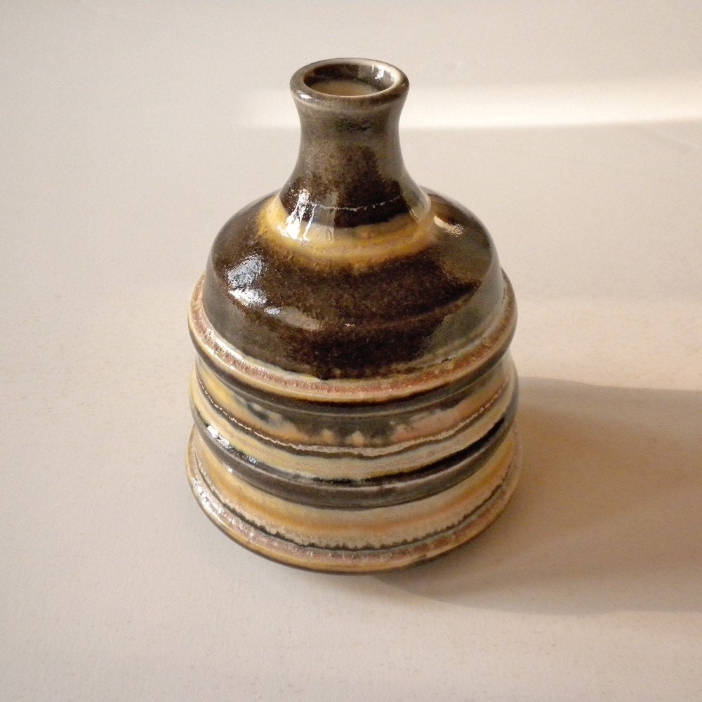 Wheel Thrown Porcelain vase with stripes.