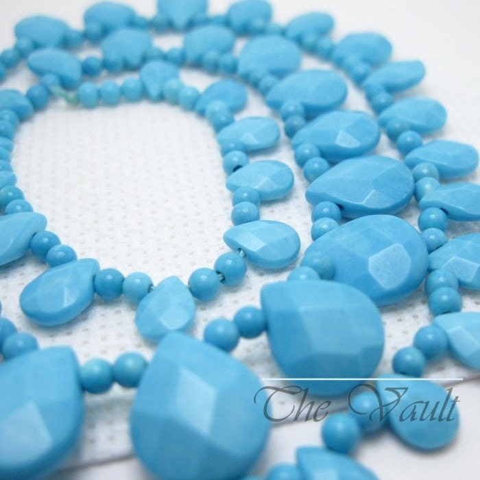Strand  Turquoise 7-12mm graduated briolette and bead strand