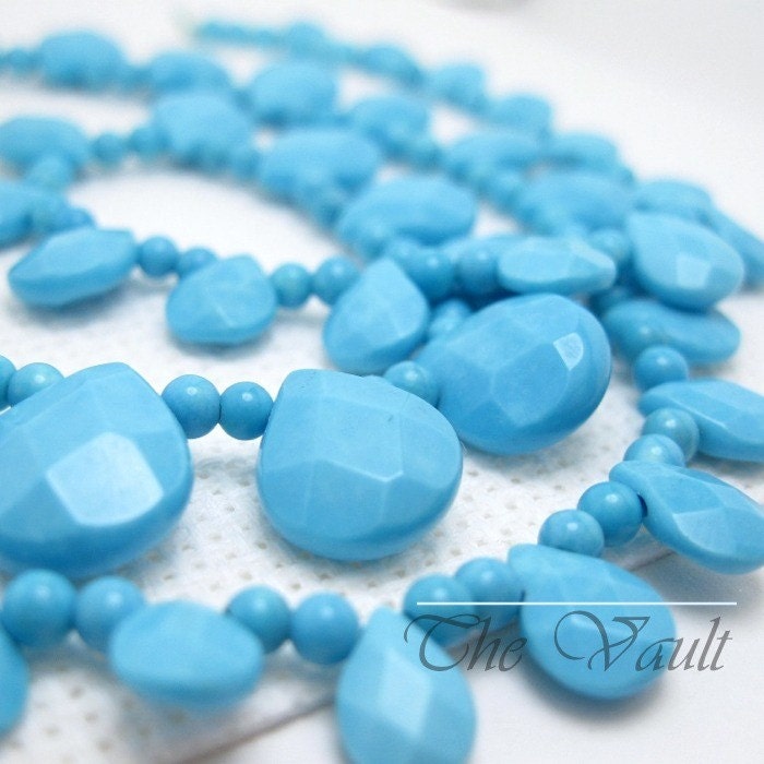 Strand  Turquoise 7-12mm graduated briolette and bead strand