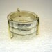 One,Two,Three - unisex stackable hammered silver rings with yellow gold
