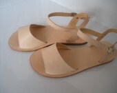 HANDMADE LEATHER SANDALS .