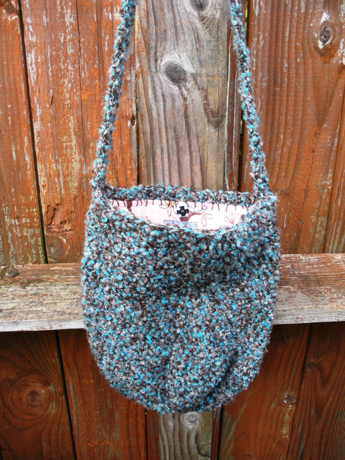 large side sash crochet purse in turquoise neutral with pink flannel birds lining