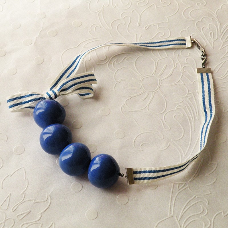 Necklace Blue resin beads and bow