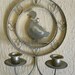Pair of vintage brass colored metal wall hanging duck candle holders