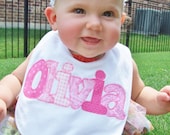 Personalized Baby Bib Appliqued in your choice of color - shown in pinks - by Tried and True Designs on Etsy - TriedAndTrueDesigns