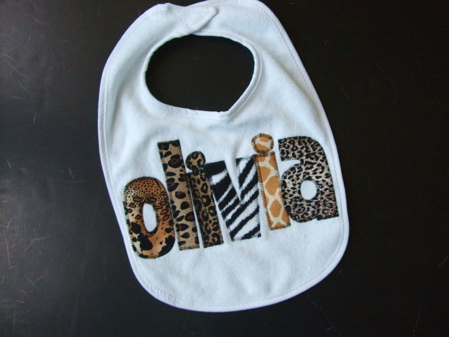 Personalized Bib Appliqued in animal prints for baby by Tried and True Designs on Etsy