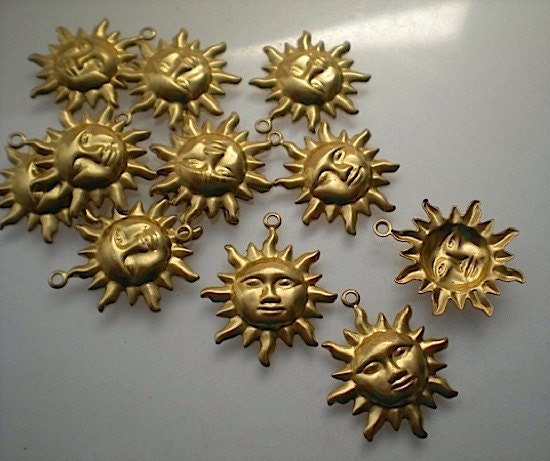 12 brass sun charms