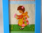 Vintage 1970s cross-stitch decor- Girl with flowers