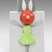 Tiny redheaded bug girl with green dress