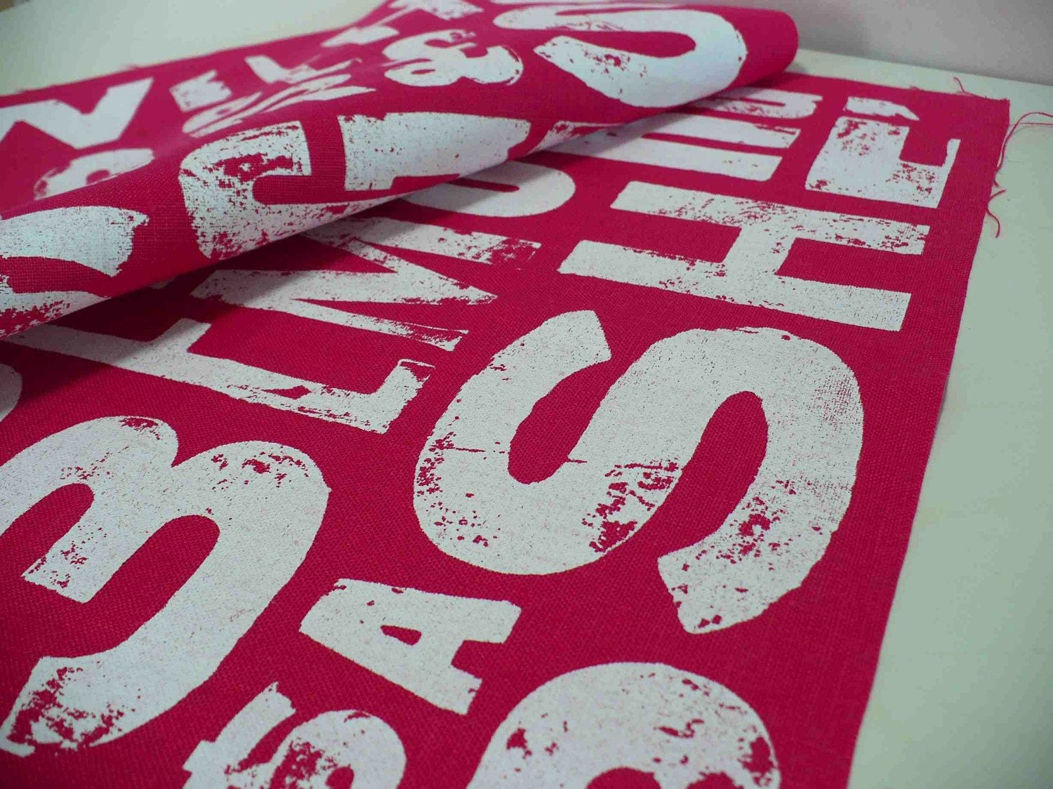 Screen printed fabric -  printed in white on hot pink linen - Type design