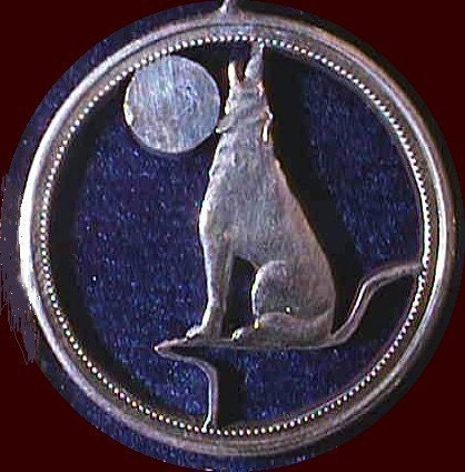 Wolf Howling at a Full Moon Cut Coin Pendant Silver Canadian Half Dollar