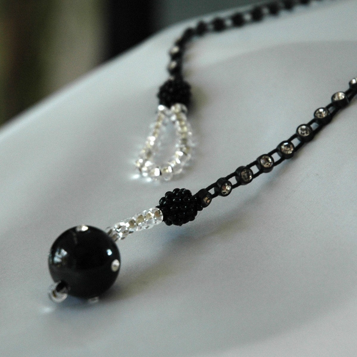 Beaded Lariat Necklace with Black/White Crystals and CZ Studded Onyx Pendant on Rhinestone Chain