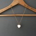 Vintage Heart Locket . Mother of Pearl. 1950s Goldtone.