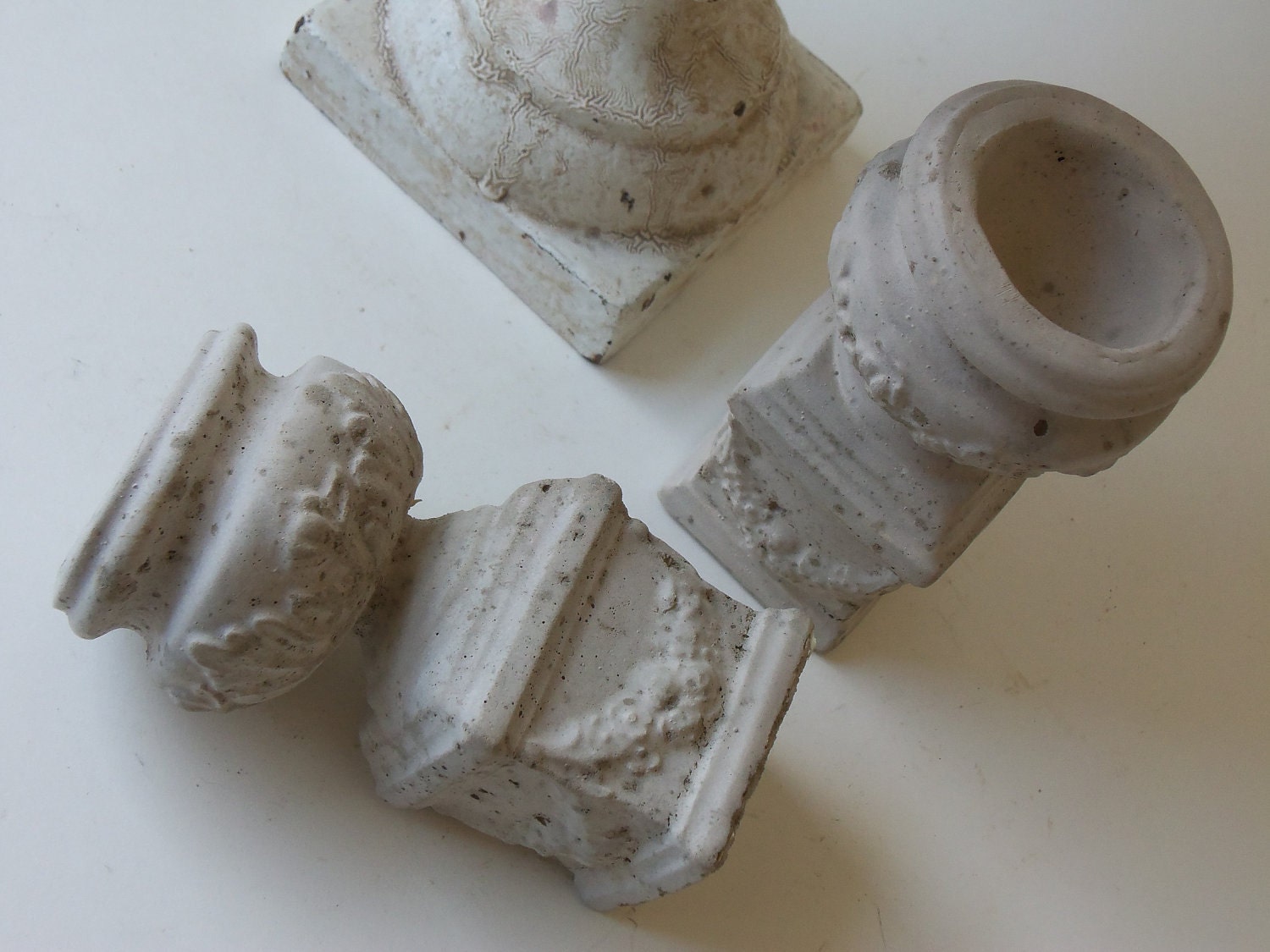 two cement urns