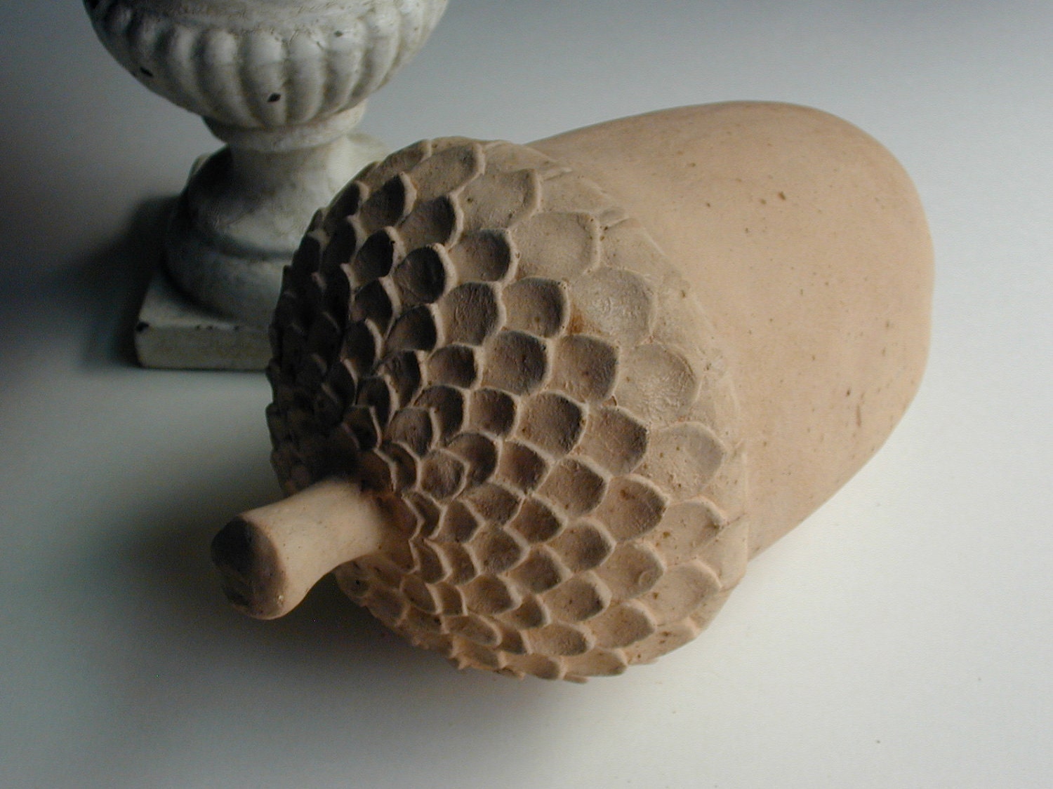 large cement acorn