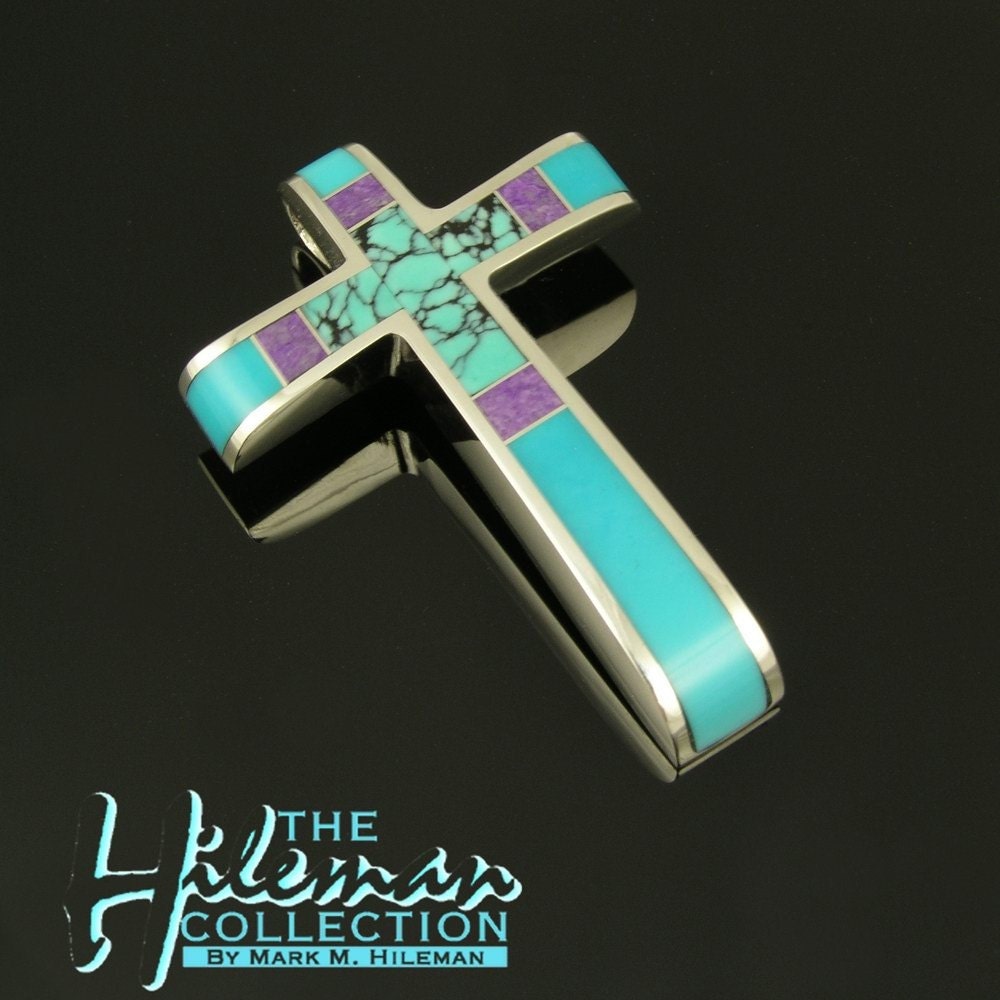 Sterling silver cross inlaid with turquoise, sugilite and spiderweb turquoise.