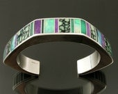 Sterling silver bracelet inlaid with sugilite, chrysoprase, Australian opal and chalcosiderite.