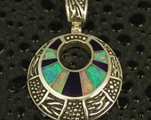 Sterling silver pendant inlaid with Australian opal and sugilite by Mark Hileman.