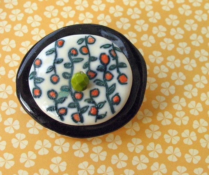 Black-orange flowers collage brooch