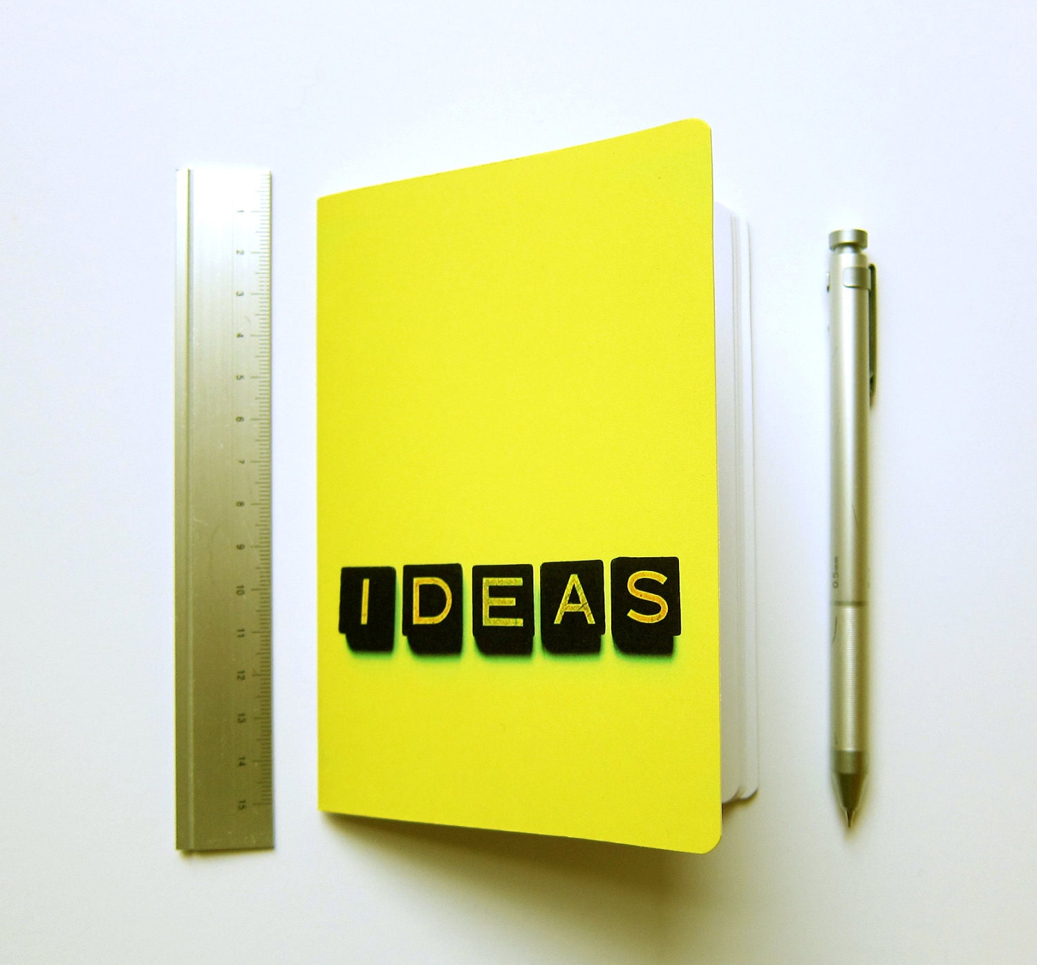 Ideas notebook jotter yellow black letters typography photograph cover A6 blank plain paper journal sketchbook Typescale stationery