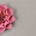 Paper dahlia gift topper in fuchsia pink