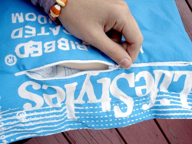 Hand silkscreened giant condom pillow with giant fabric condom