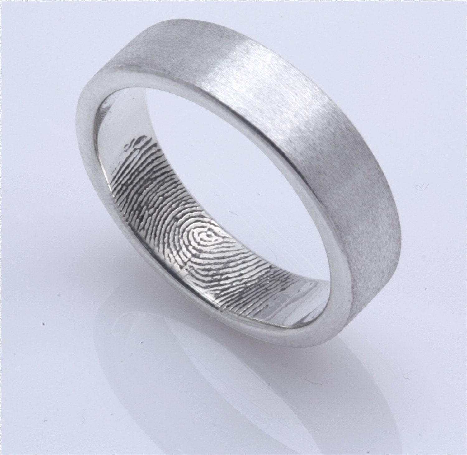 Custom Fingerprint Wedding band with single fingertip whorl inside in sterling silver