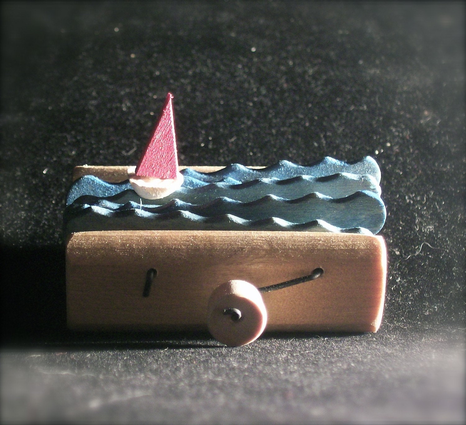 red sailboat wooden automata by cartoonmonster on Etsy