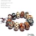 TRIBAL Handmade Lampwork Bead Set in Sienna Brown Melon Turquoise Black Ivory Wild COlors Set of 12