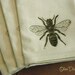 Set of 4 Light Cream Cloth Dinner Napkins with Black BEES