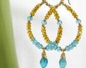 Isis Chandeliers: Apatite and Hessonite Garnet