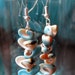 Beach beauty cream and teal shell earrings