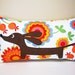 Doxie in the Vibrant Garden Decorative Rectangular Dachshund Pillow Featuring Designer Cotton Fabric in Warm Tones READY TO SHIP
