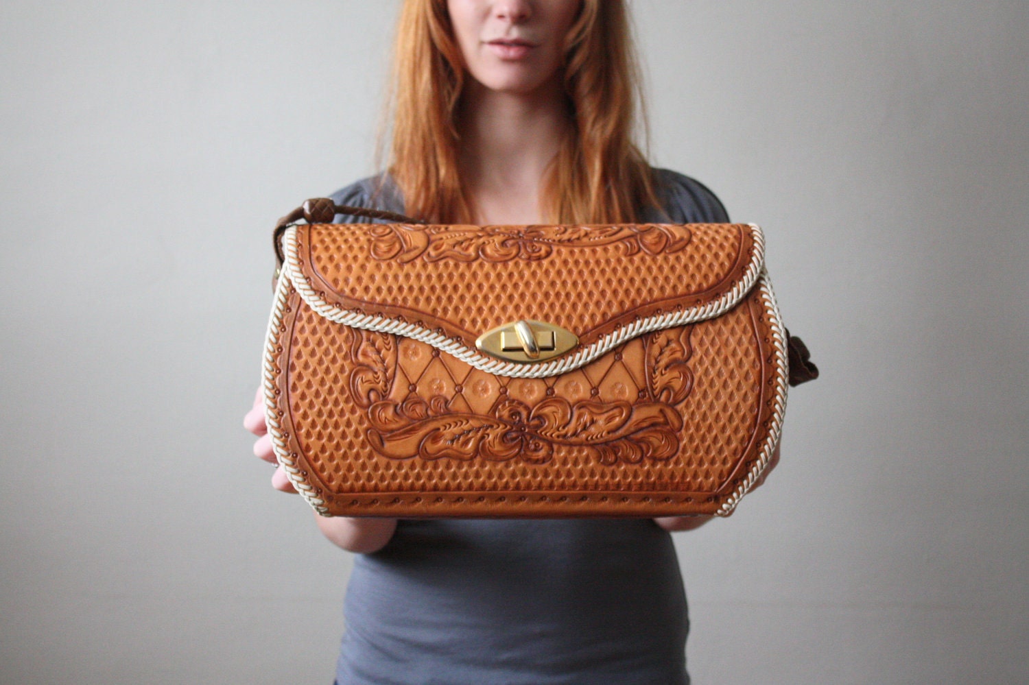 1970's tooled leather messenger bag