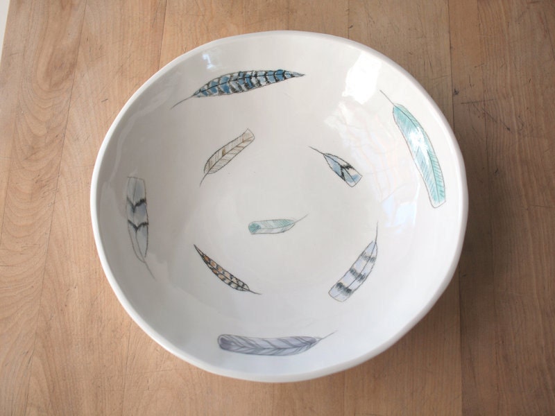 large porcelain bowl with feathers