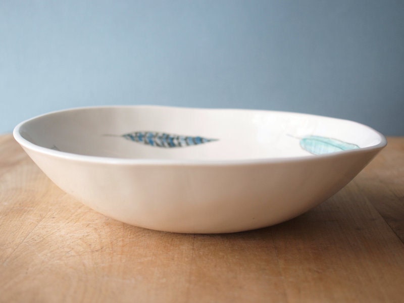 large porcelain bowl with feathers