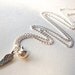 Miscarriage necklace, silver angel wing and tinkling bell charms on silverplated chain infant loss remembrance